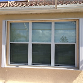 Accordion Hurricane Shutters installed in Naples.